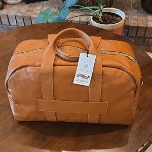 Elegant Tan Leather Duffel Bag